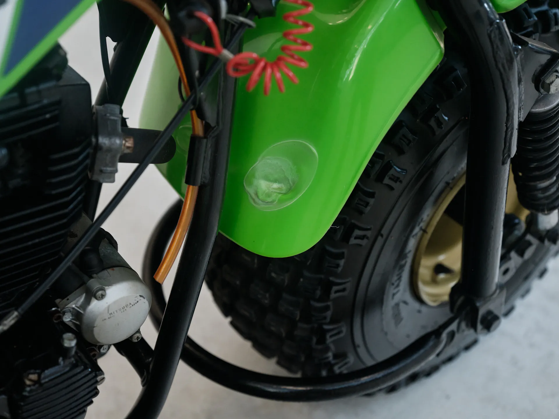 1985 Kawasaki KLT 250 fender ding