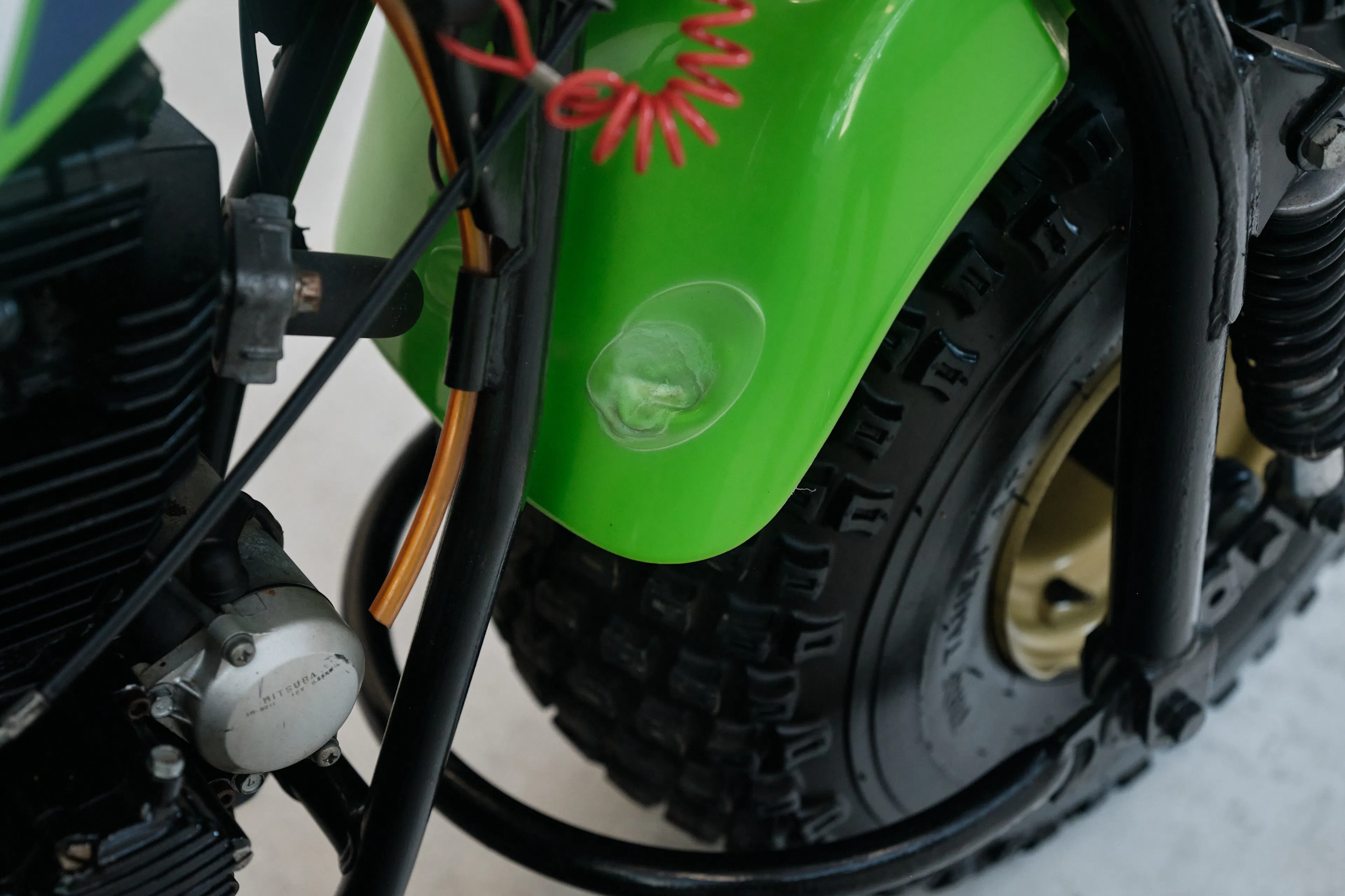 1985 Kawasaki KLT 250 fender ding