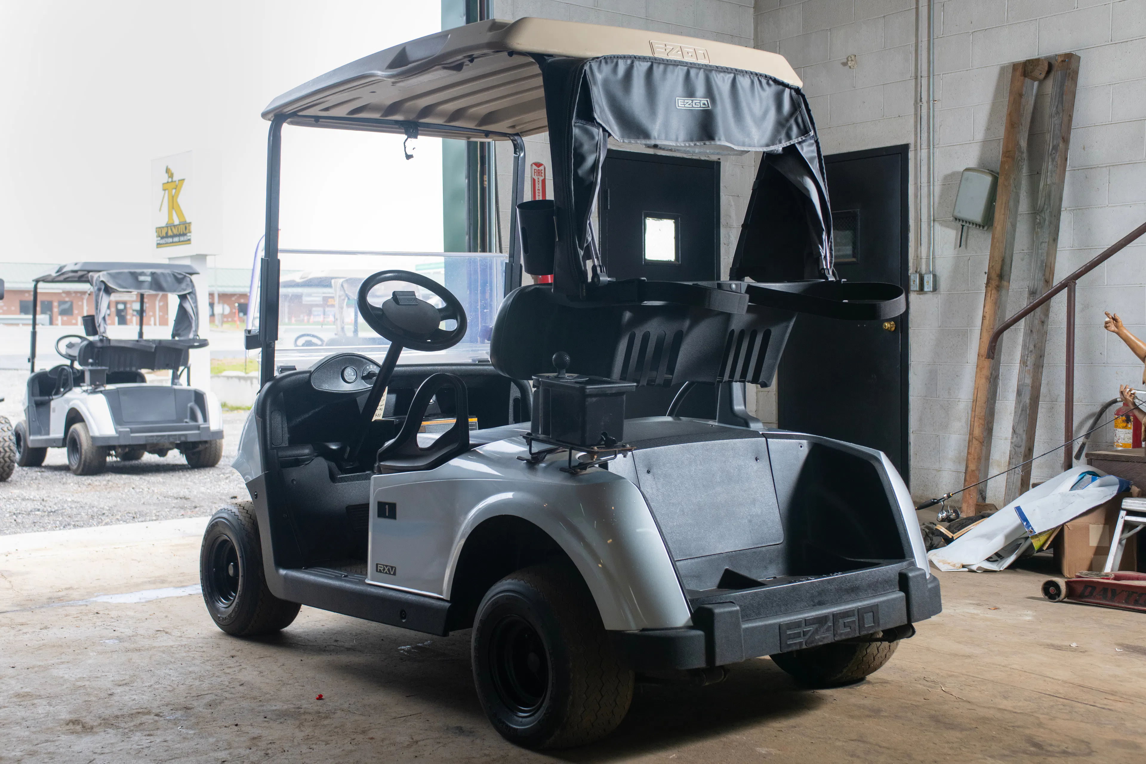 2020 E-Z-Go RXV Silver driver rear 3/4