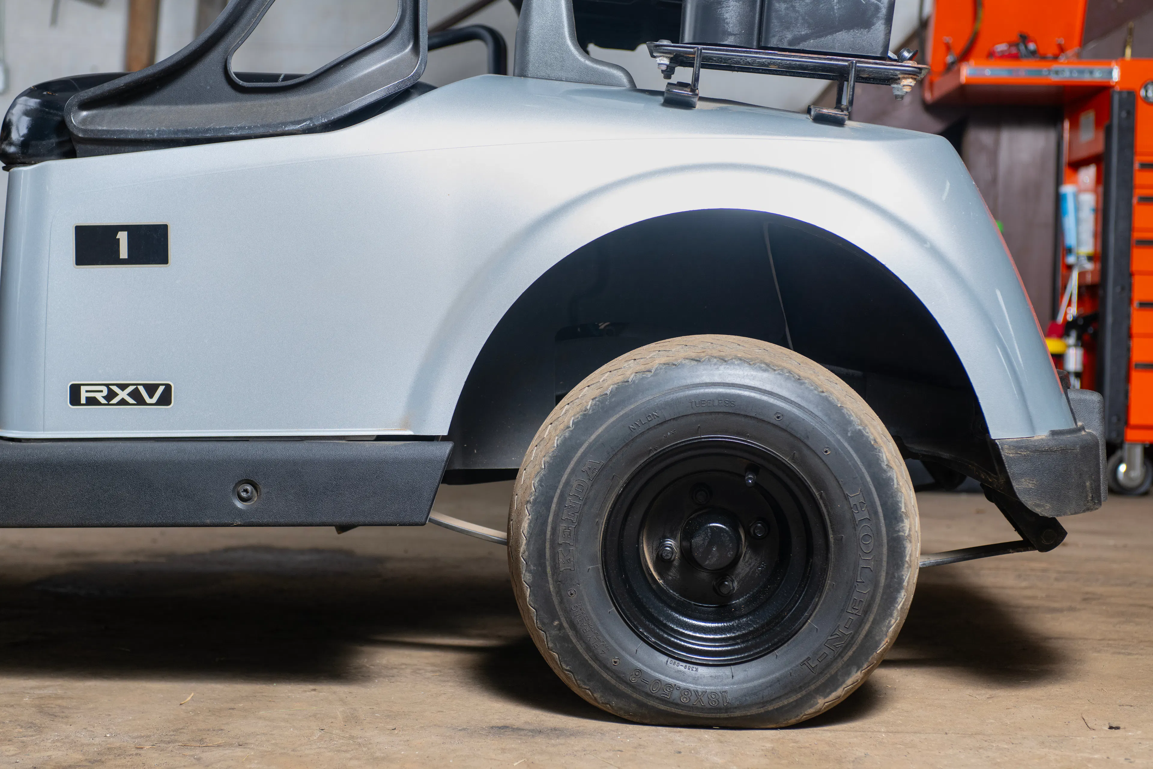 2020 E-Z-Go RXV Silver driver rear tire