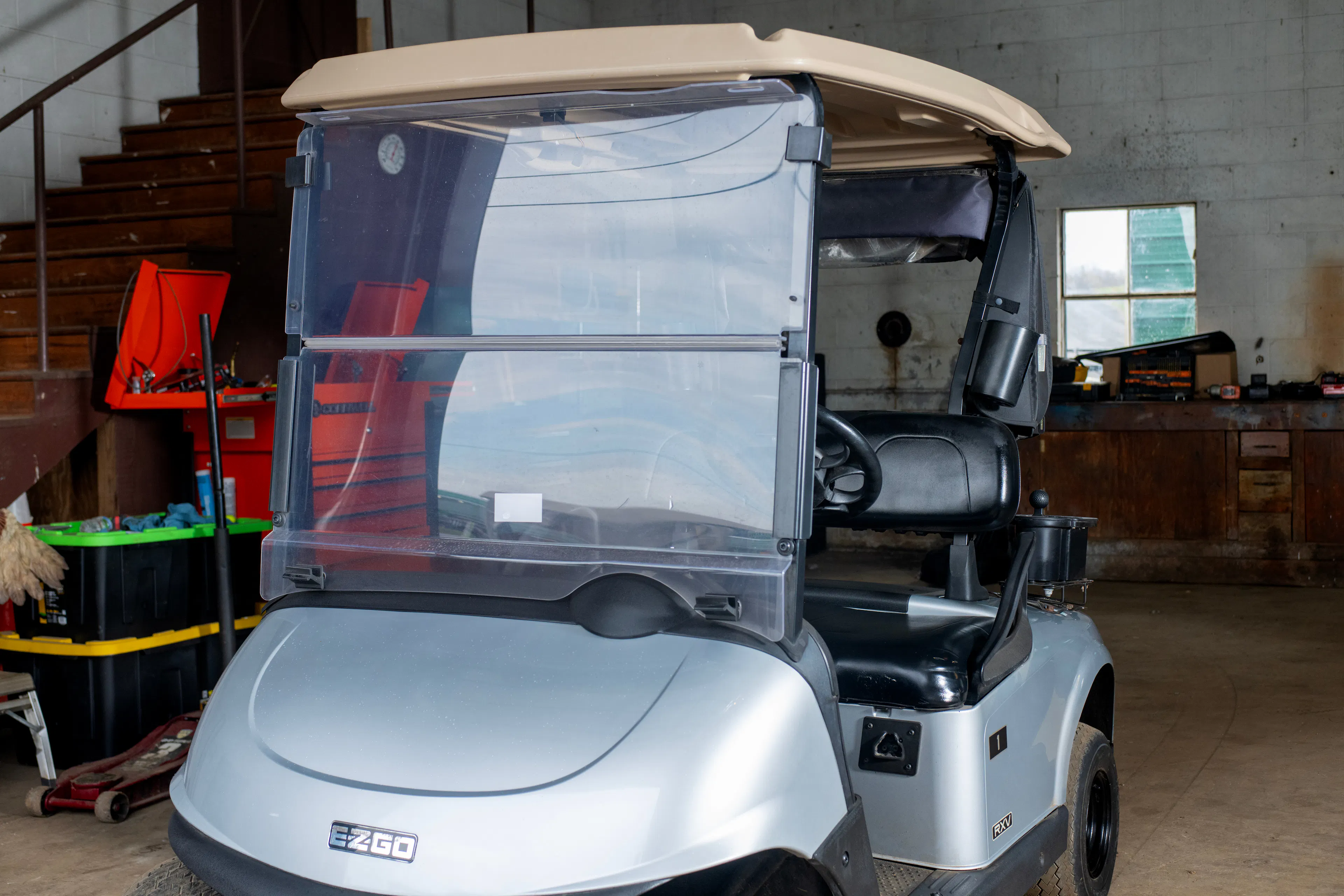 2020 E-Z-Go RXV Silver front driver 3/4 close