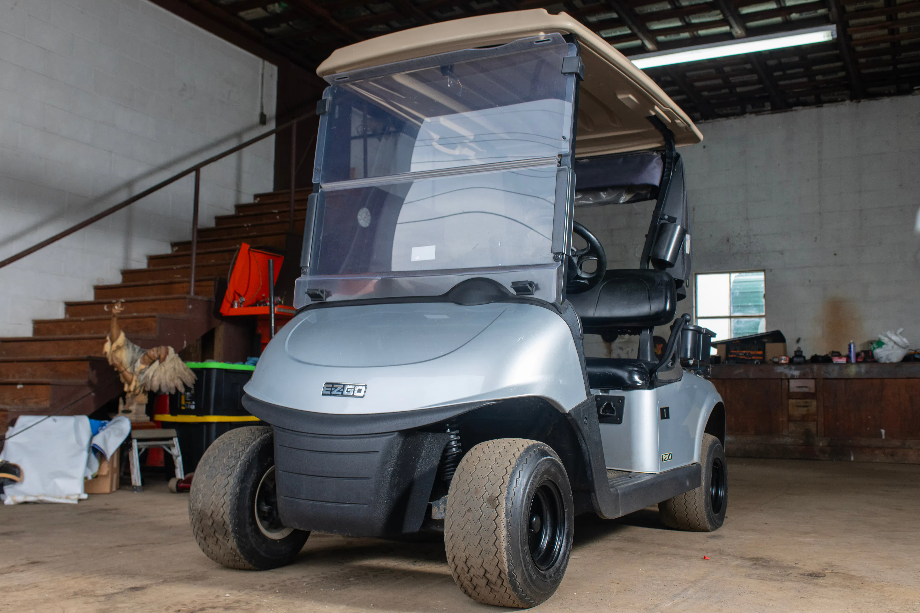 2020 E-Z-Go RXV Silver front driver 3/4