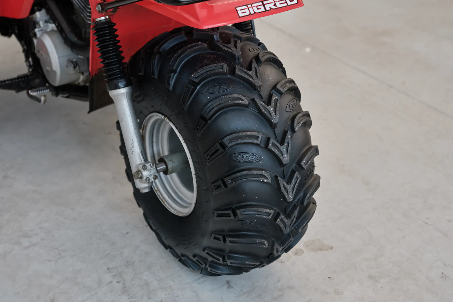 1986 Honda ATC 250ES Big Red front wheel right 3/4 steep