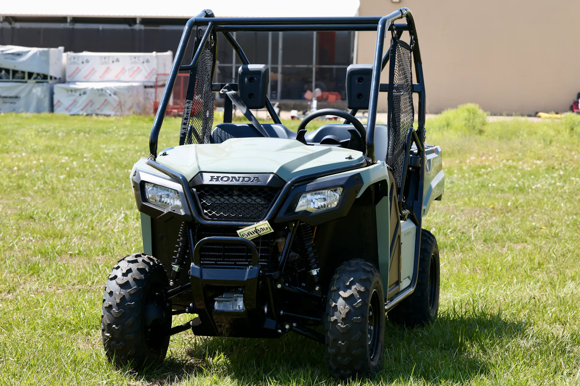 2026 Honda Pioneer 520 front driver 3/4 shallow