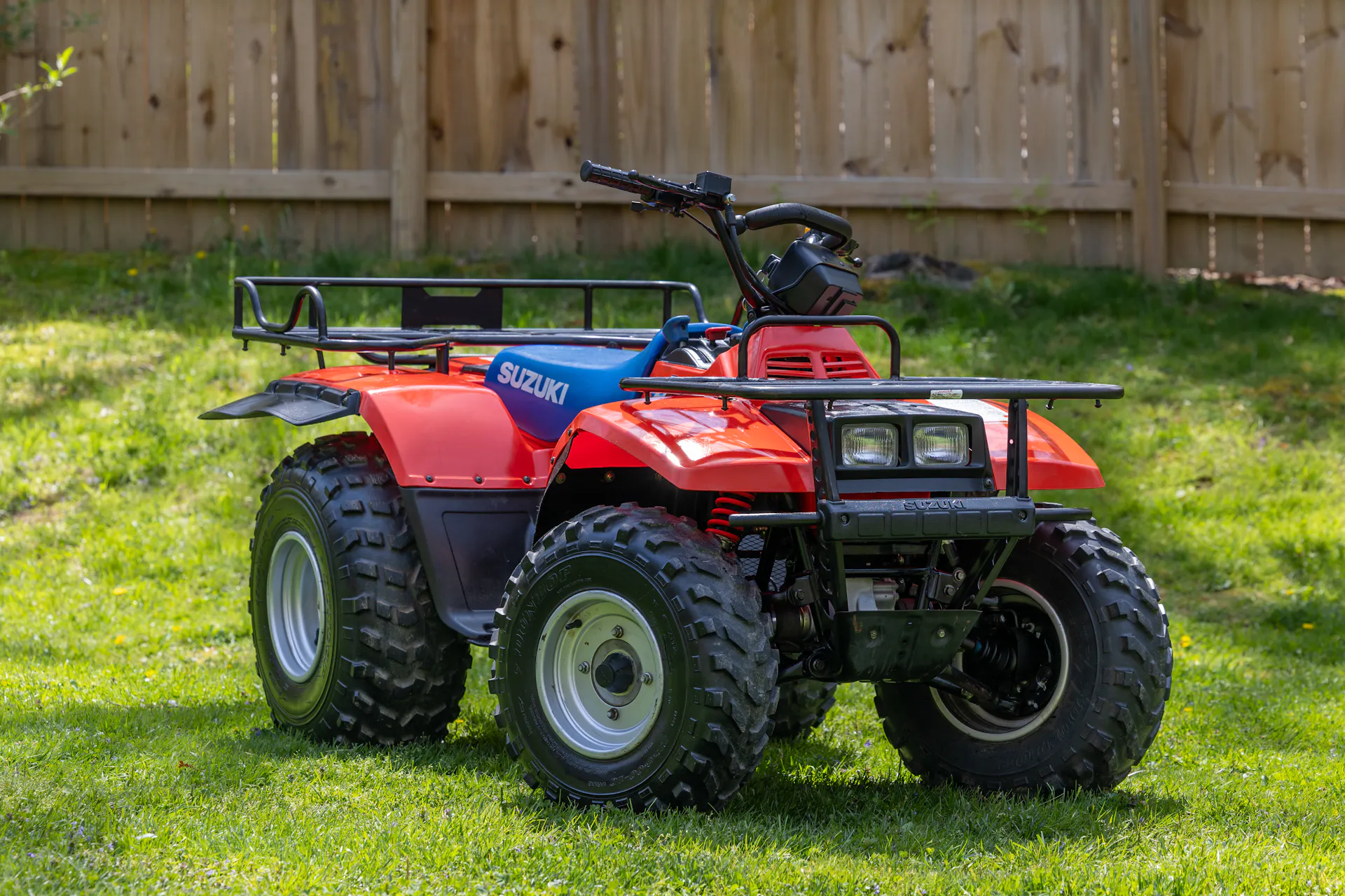 1987 Suzuki QuadRunner 250 4WD front 3/4 passenger low
