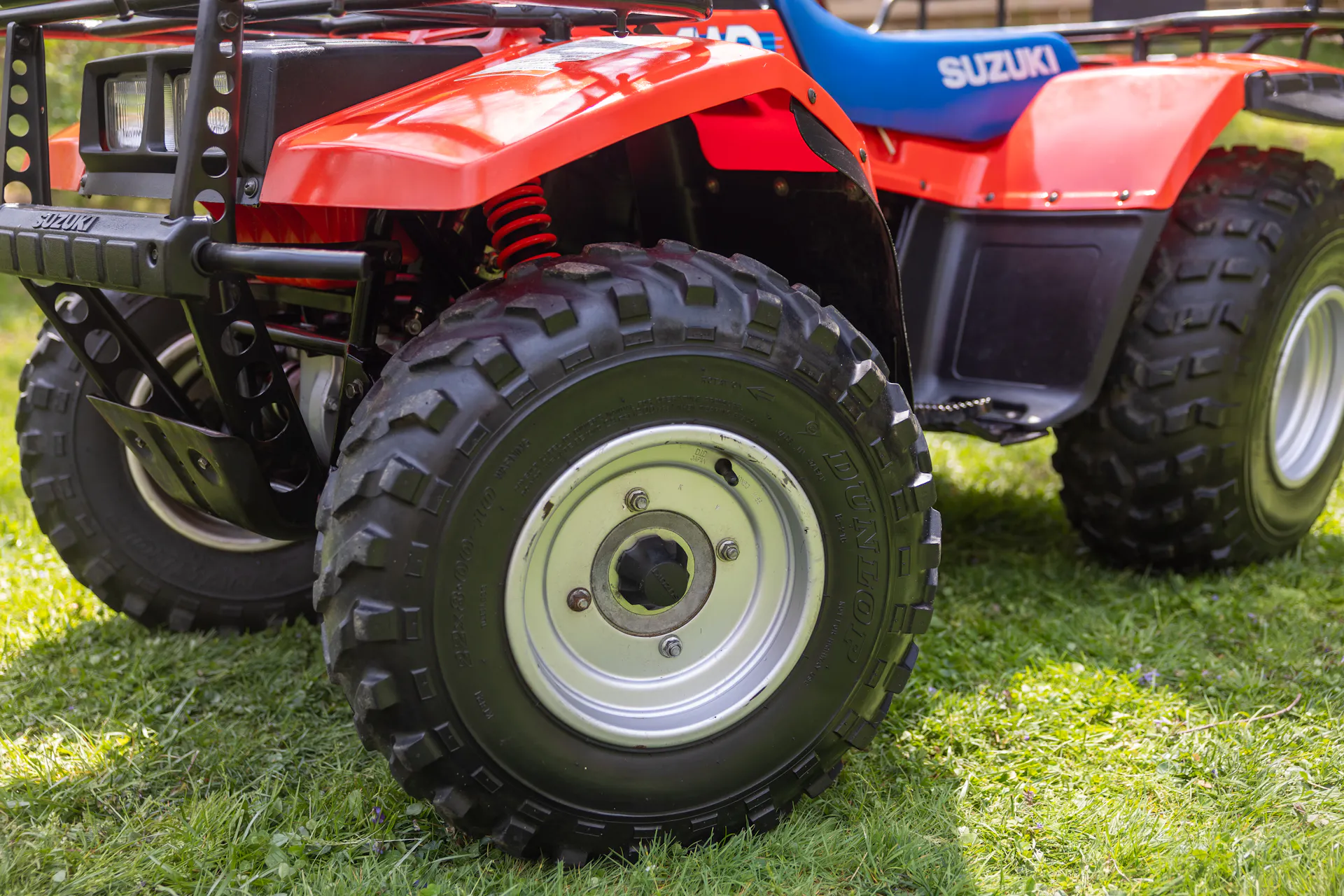 1987 Suzuki QuadRunner 250 4WD driver front wheel wide