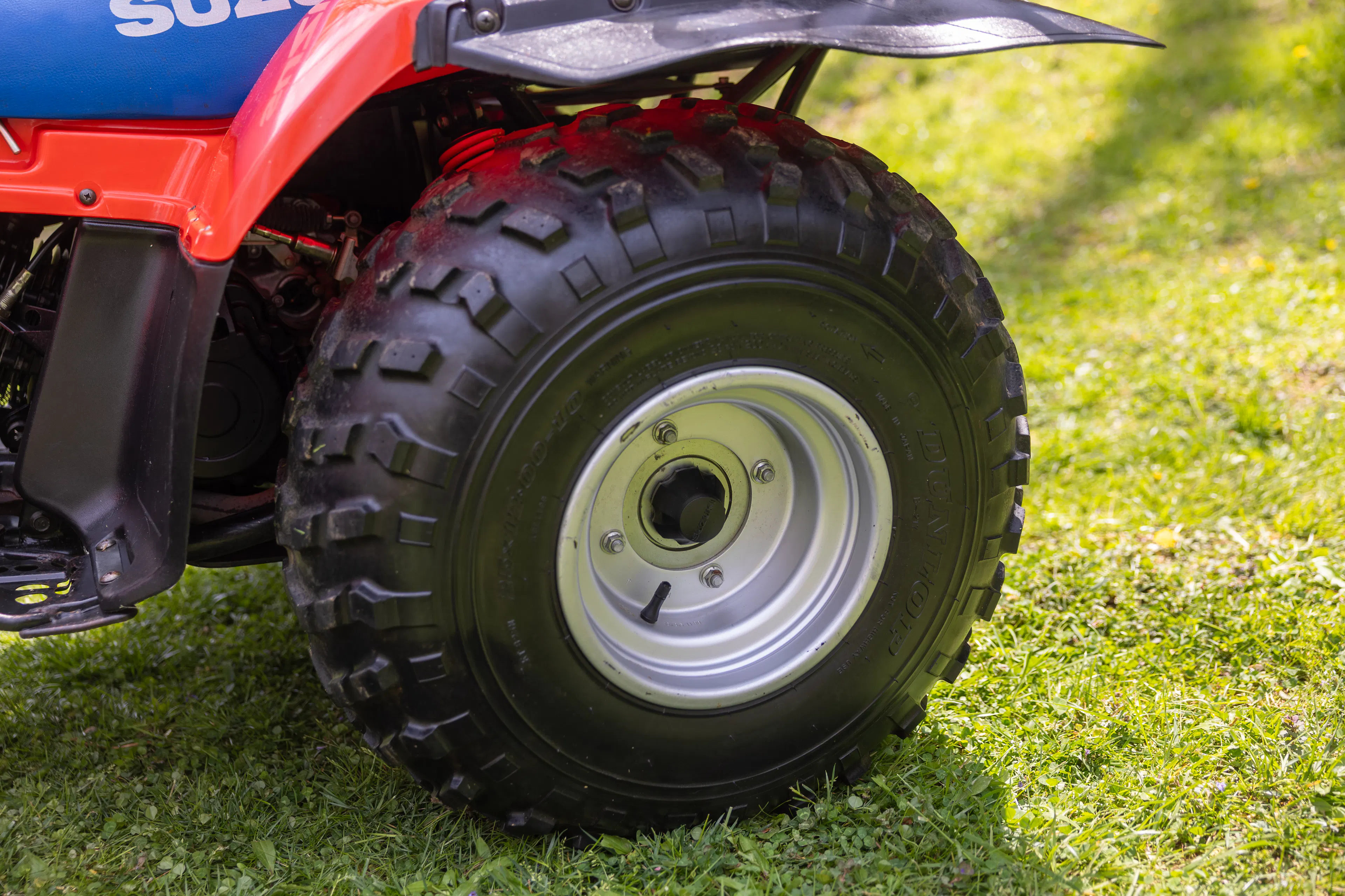 1987 Suzuki QuadRunner 250 4WD driver side rear wheel
