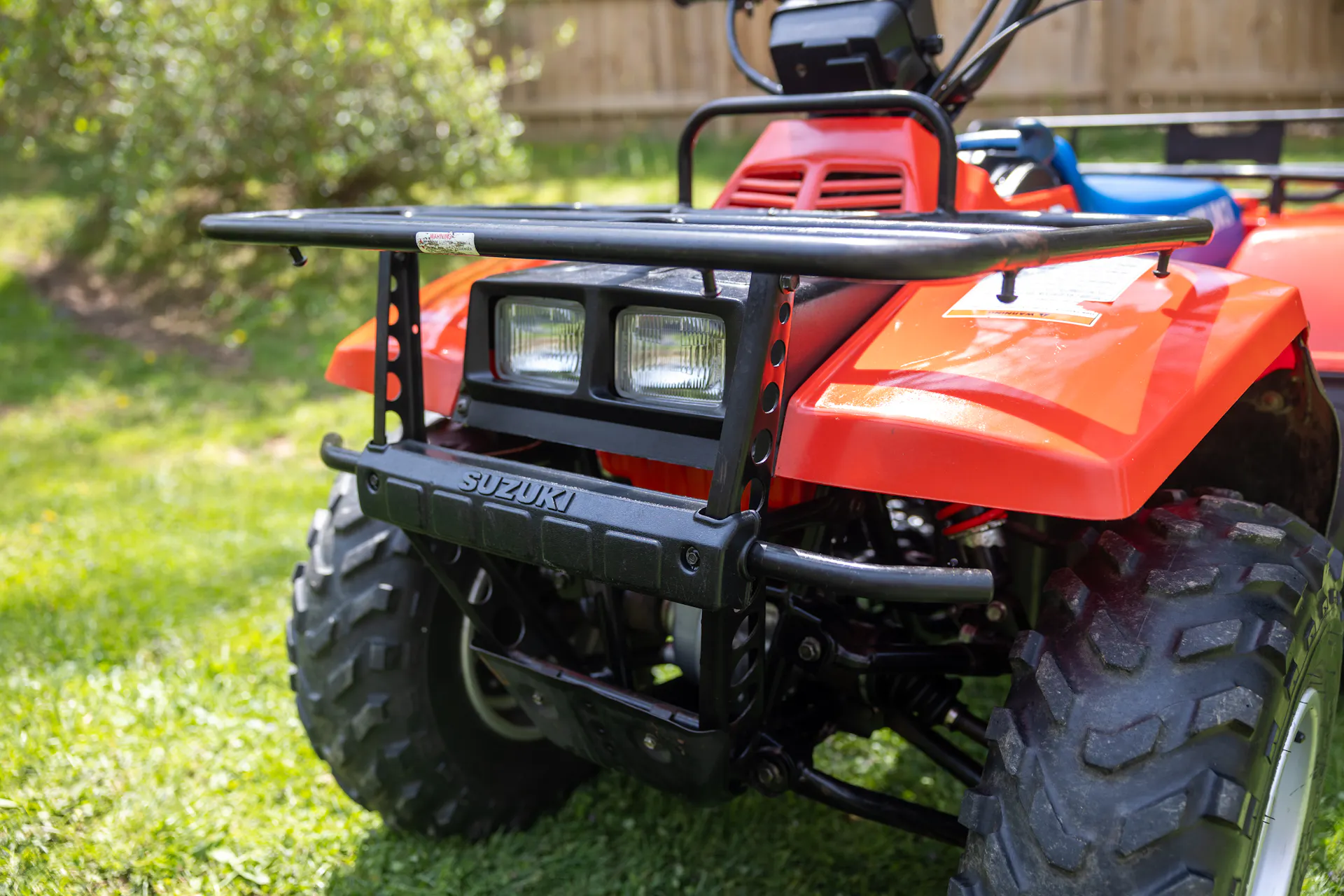 1987 Suzuki QuadRunner 250 4WD headlights, front bumper, cargo rack 