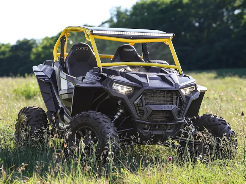 2023 RZR XP 1000 in a field