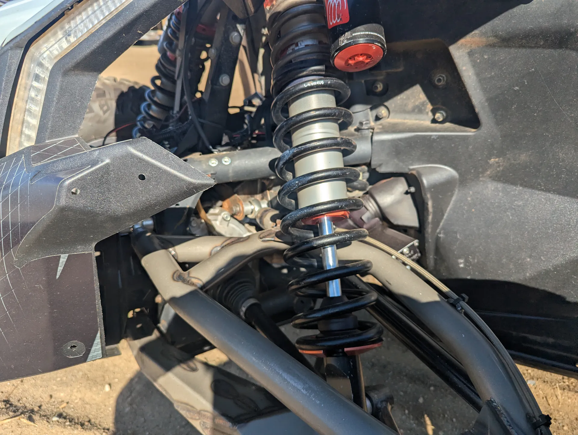 2023 Can-Am Maverick X3 X RS Turbo RR Race Car driver front suspension 