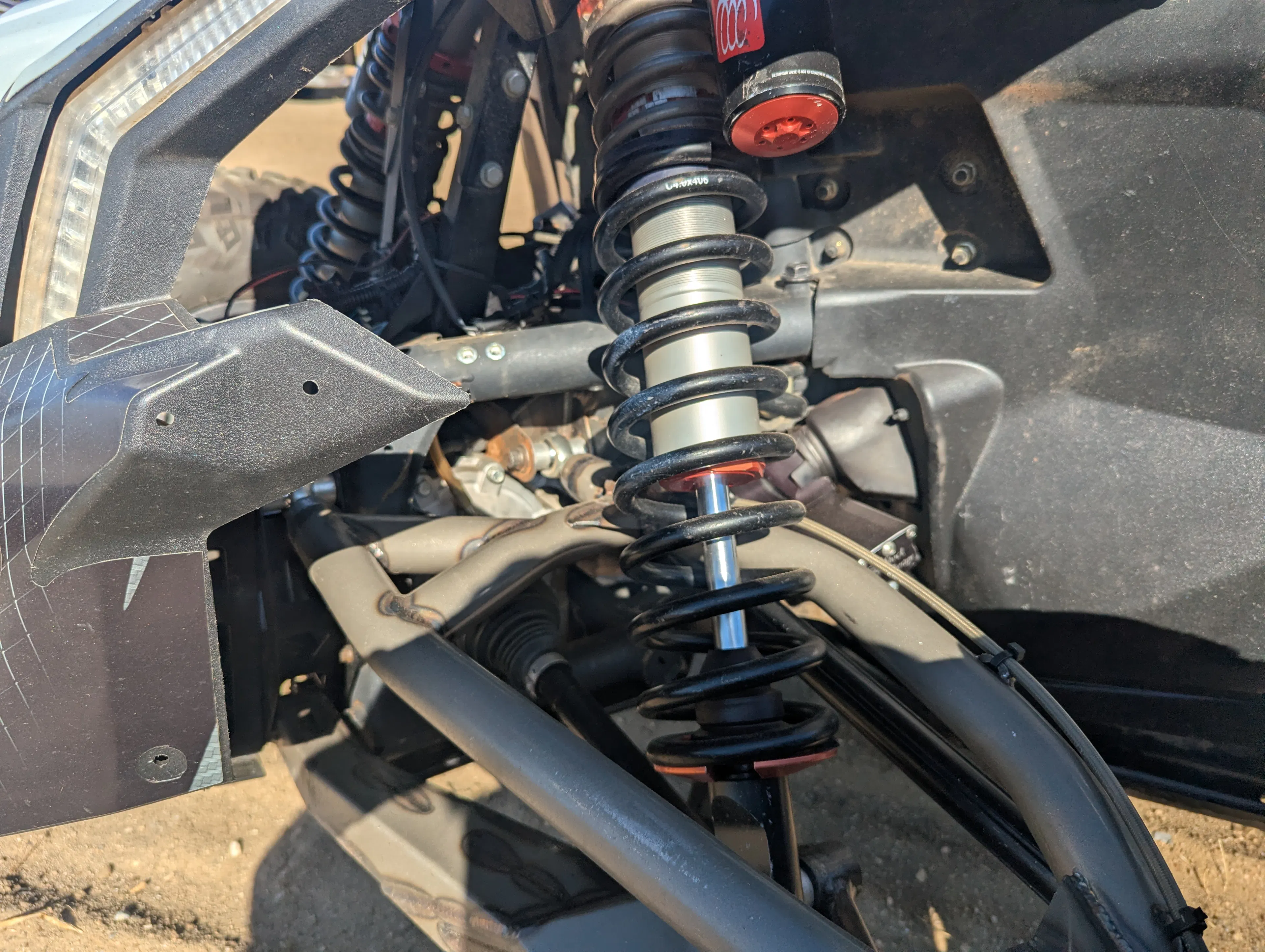 2023 Can-Am Maverick X3 X RS Turbo RR Race Car driver front suspension 