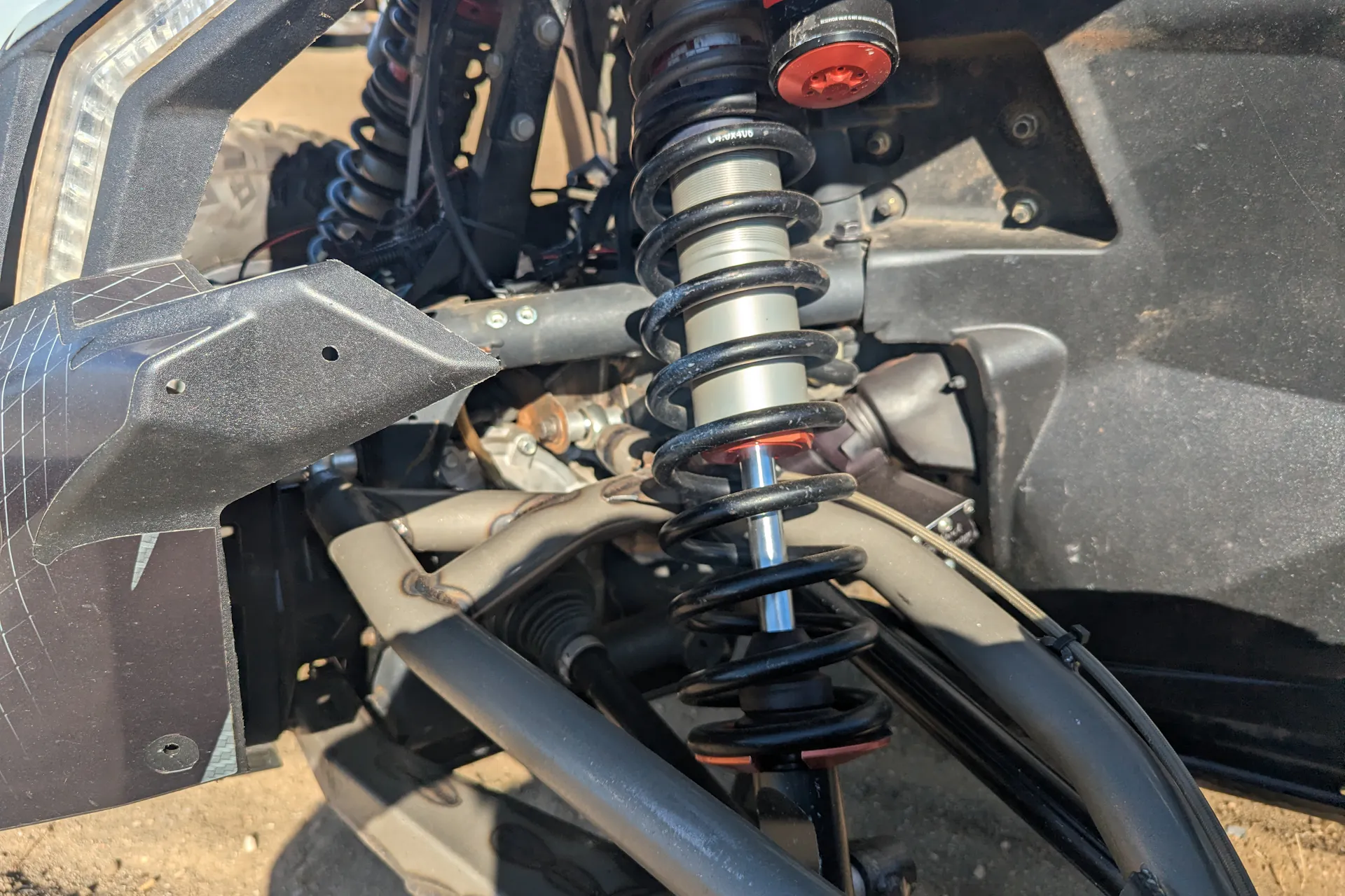 2023 Can-Am Maverick X3 X RS Turbo RR Race Car driver front suspension