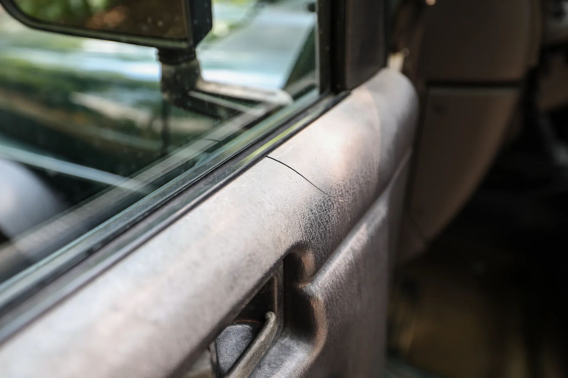 1999 Jeep Wrangler Sport driver door panel crack 