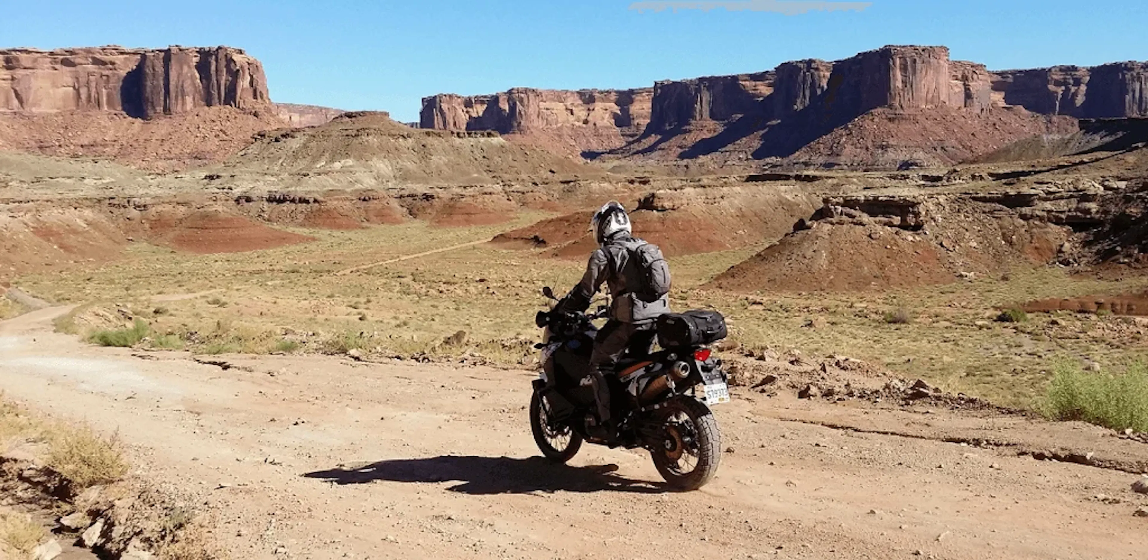 Panoramic image of a dirt bike in a desert