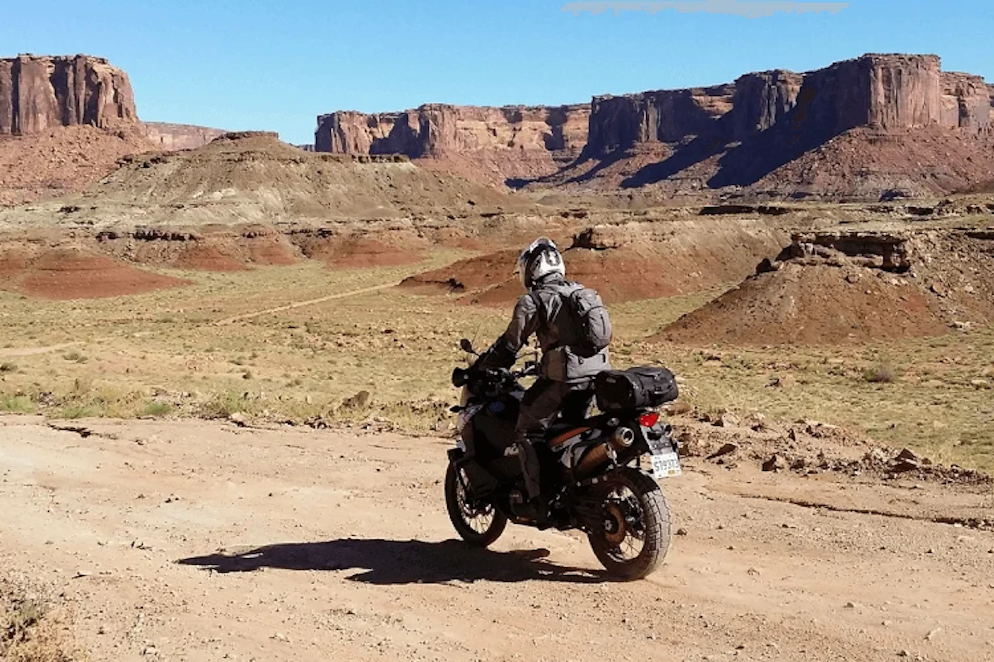 Panoramic image of a dirt bike in a desert