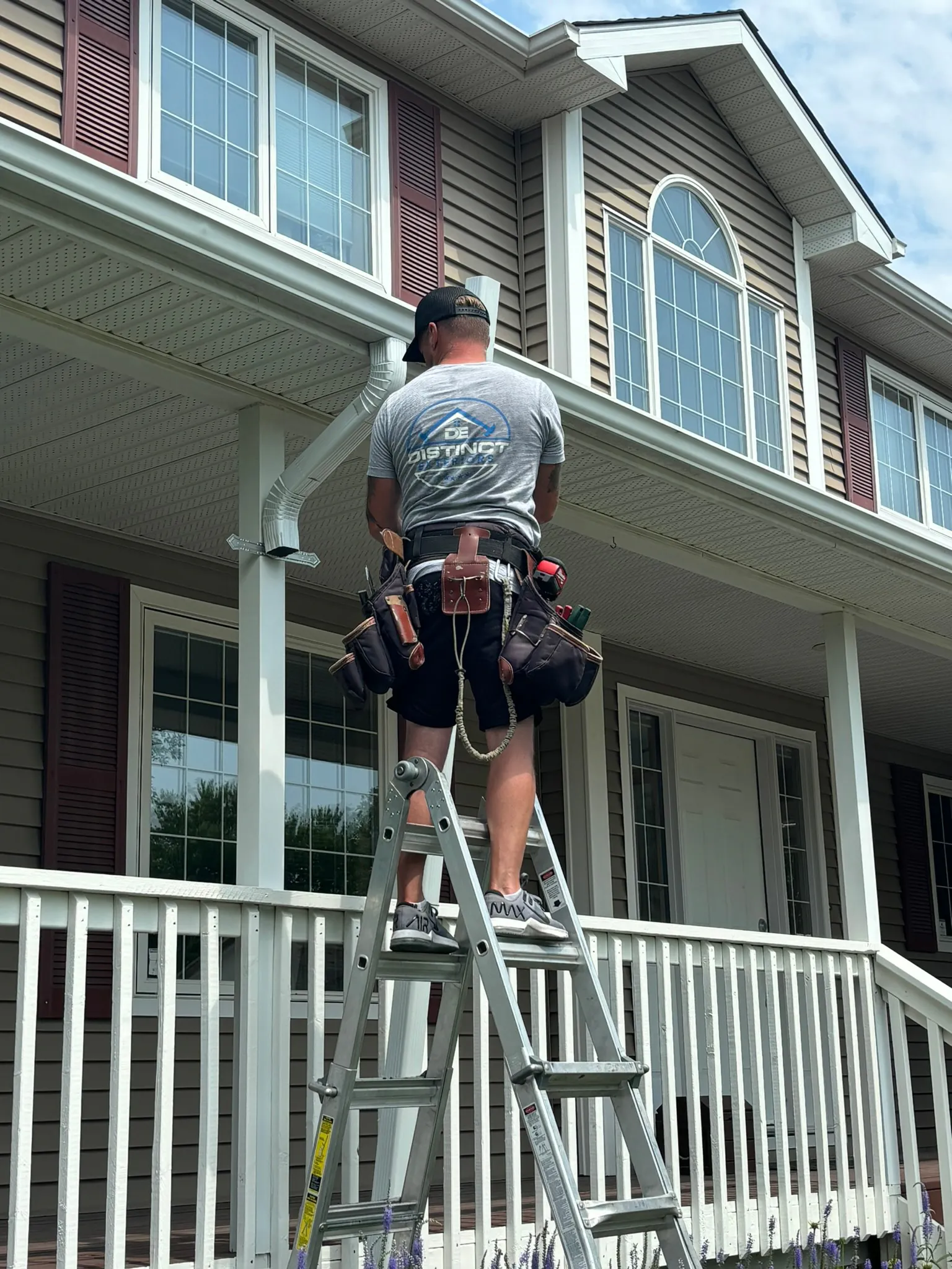 Murray working on a home exterior
