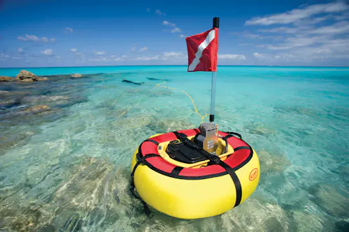 brownies hookah diving system floating in the ocean