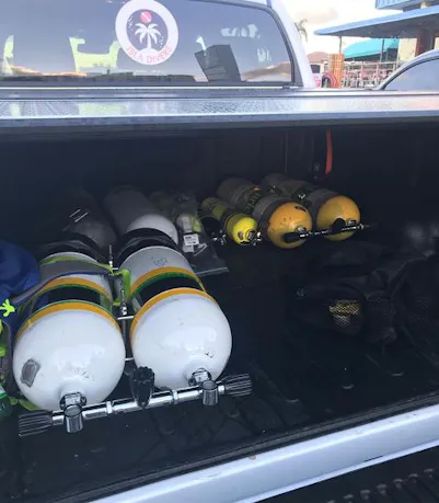 scuba tanks in bed of truck