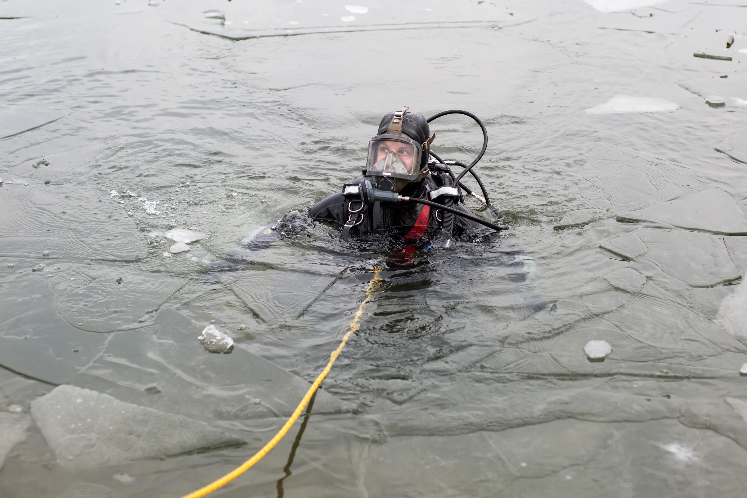 professional diver in ice water