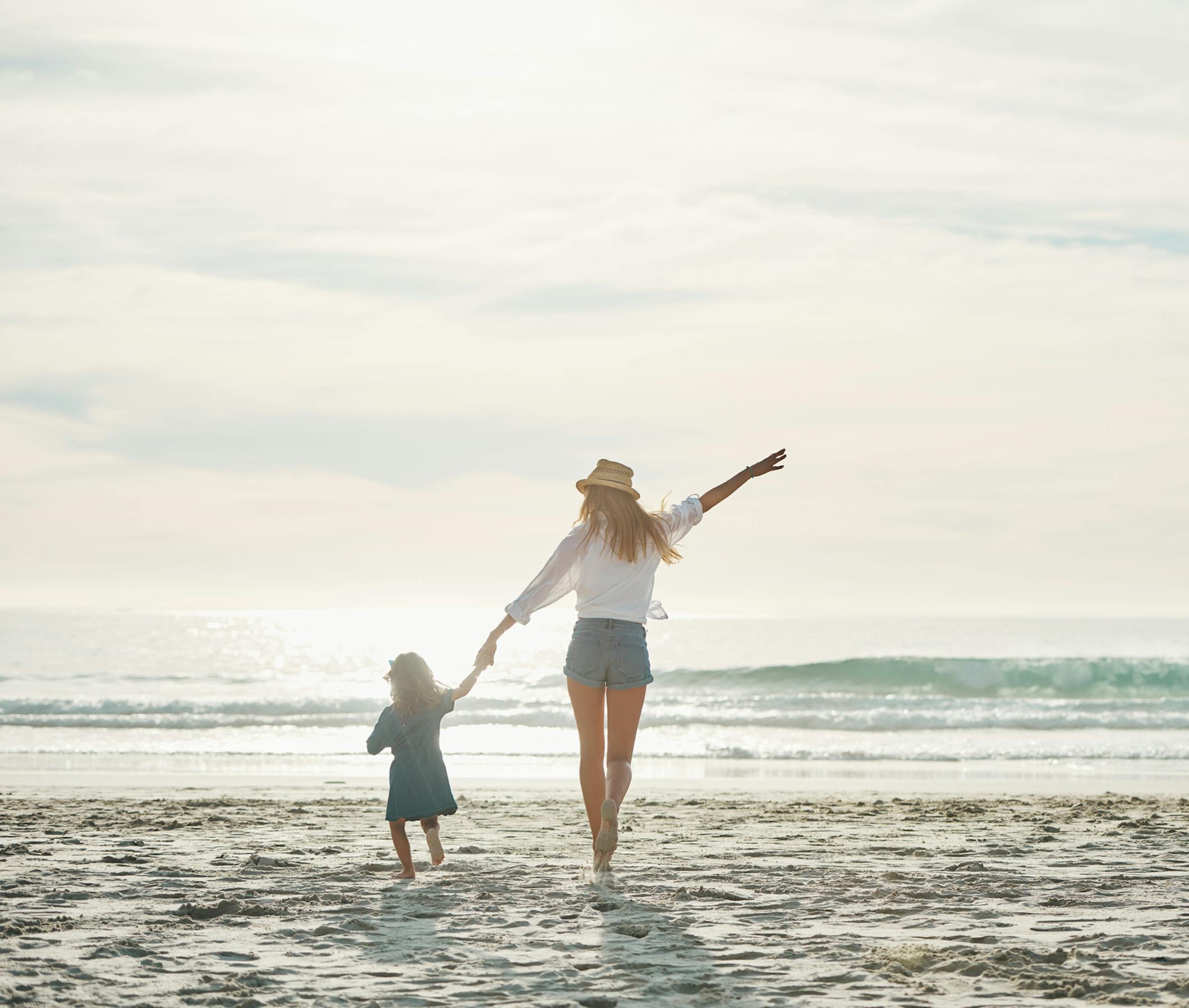 mother and infant at the beach