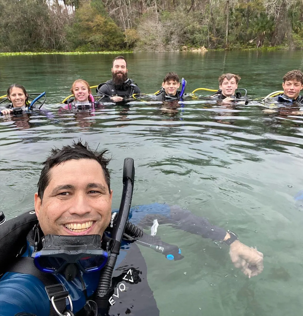 ORL instructor with students at water's surface
