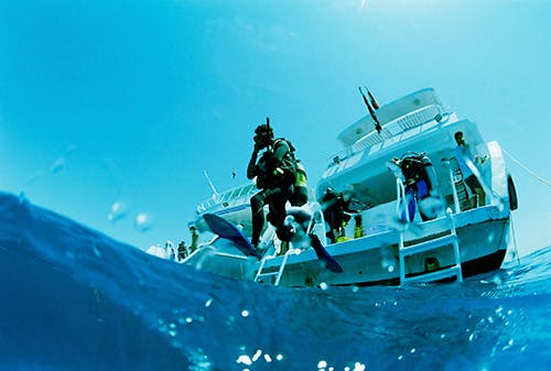 Diver doing a giant stride entry