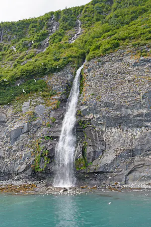 Waterfall falling into a pond