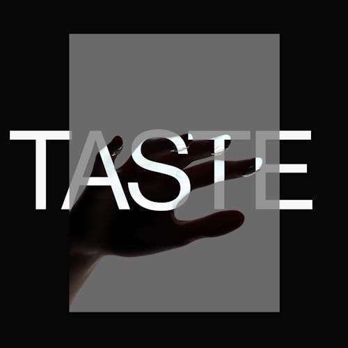 taste written over a photo of a hand with sensors