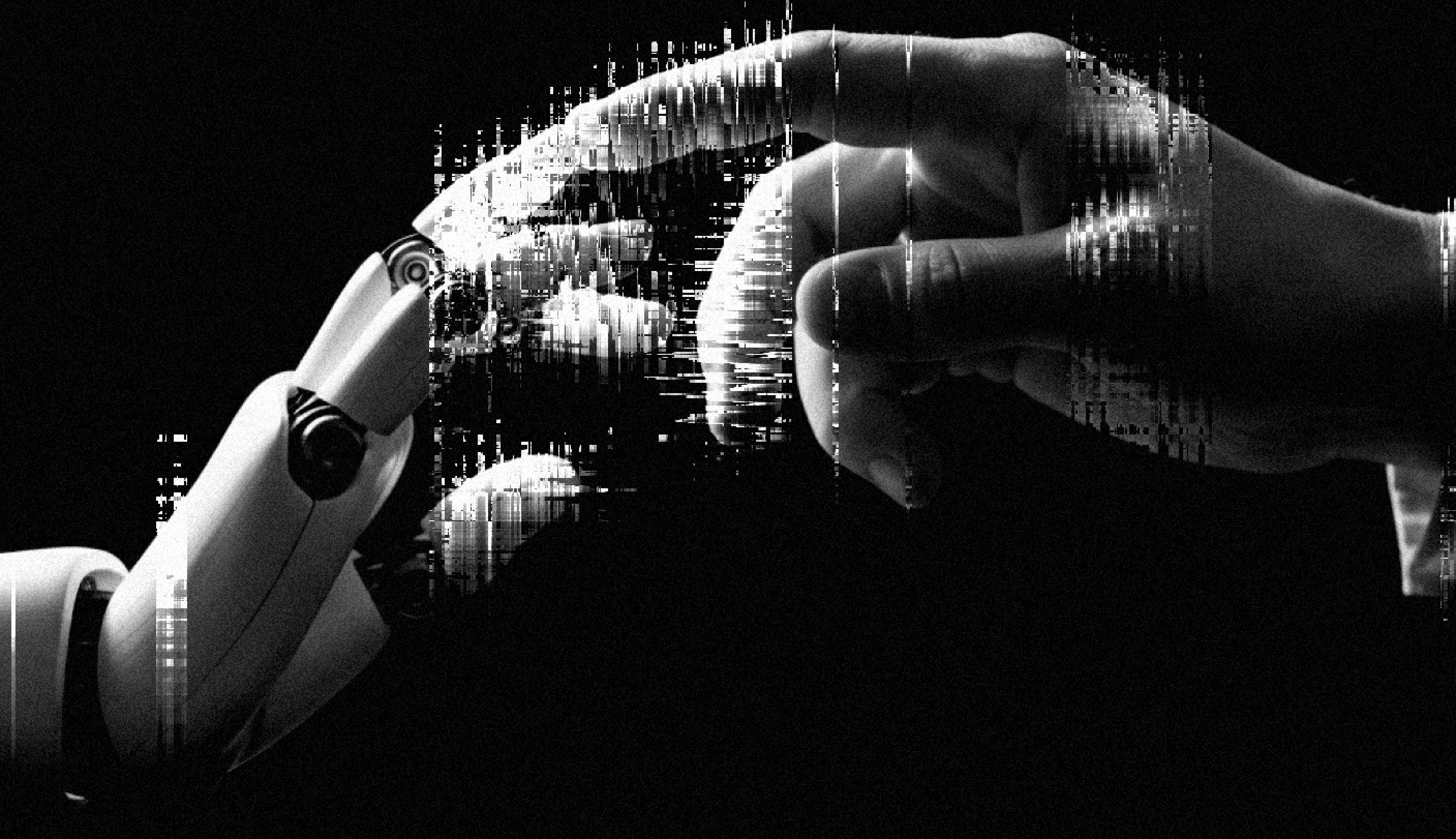 Robotic and human hands reach out to touch in a black and white image, highlighting themes of technology and connection.

