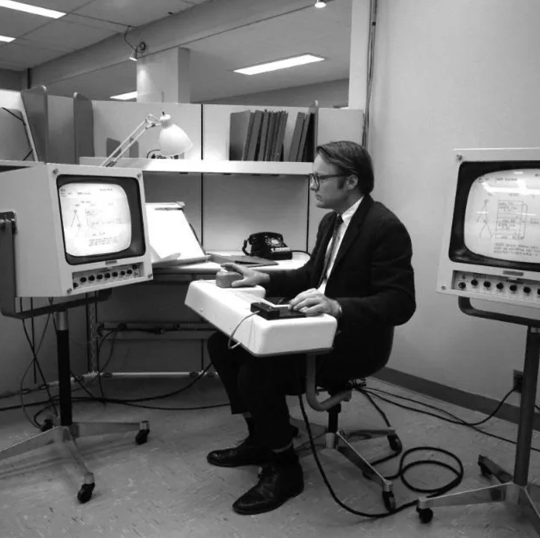 Doug Engelbart at an NLS workstation