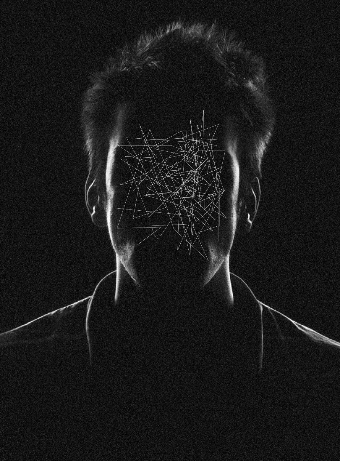 backlit headshot with the face hidden 