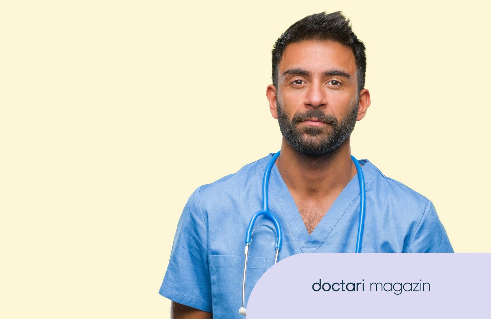 Junger Arzt blickt ernst in die Kamera.