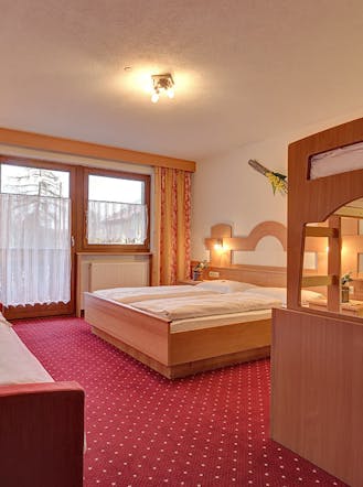 Stanza hotel tre stelle per famiglie in alto adige