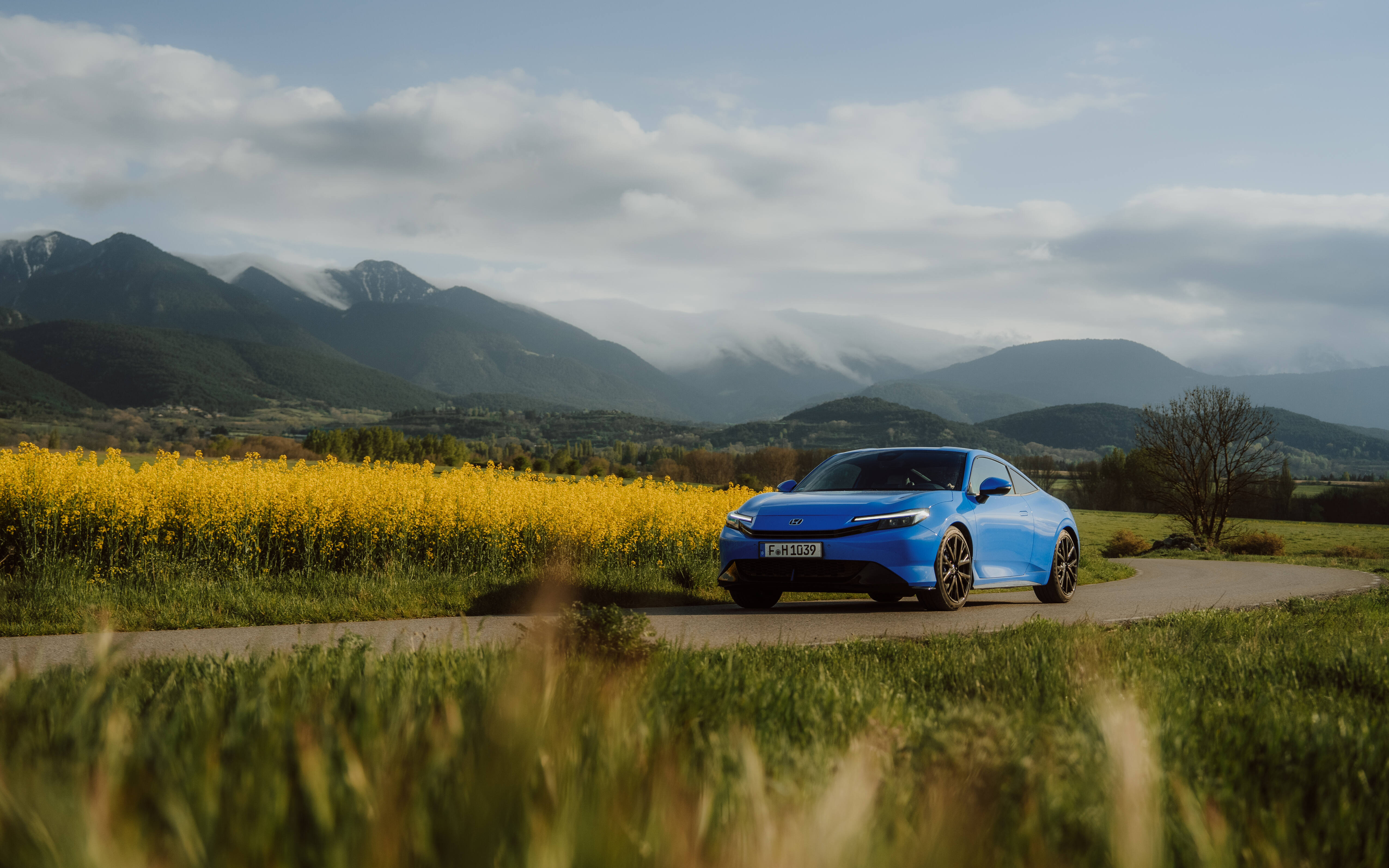 A blue Honda Prelude - Image 1