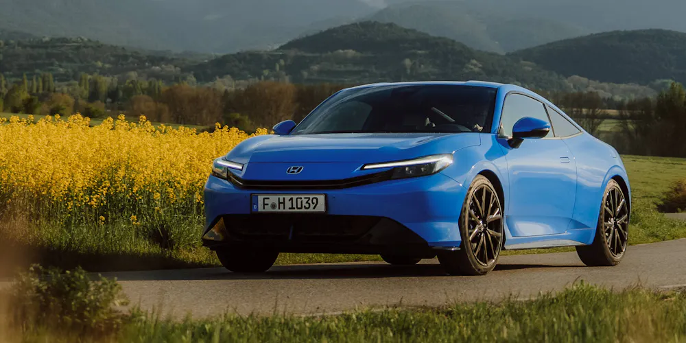 A blue Honda Prelude - Image 1
