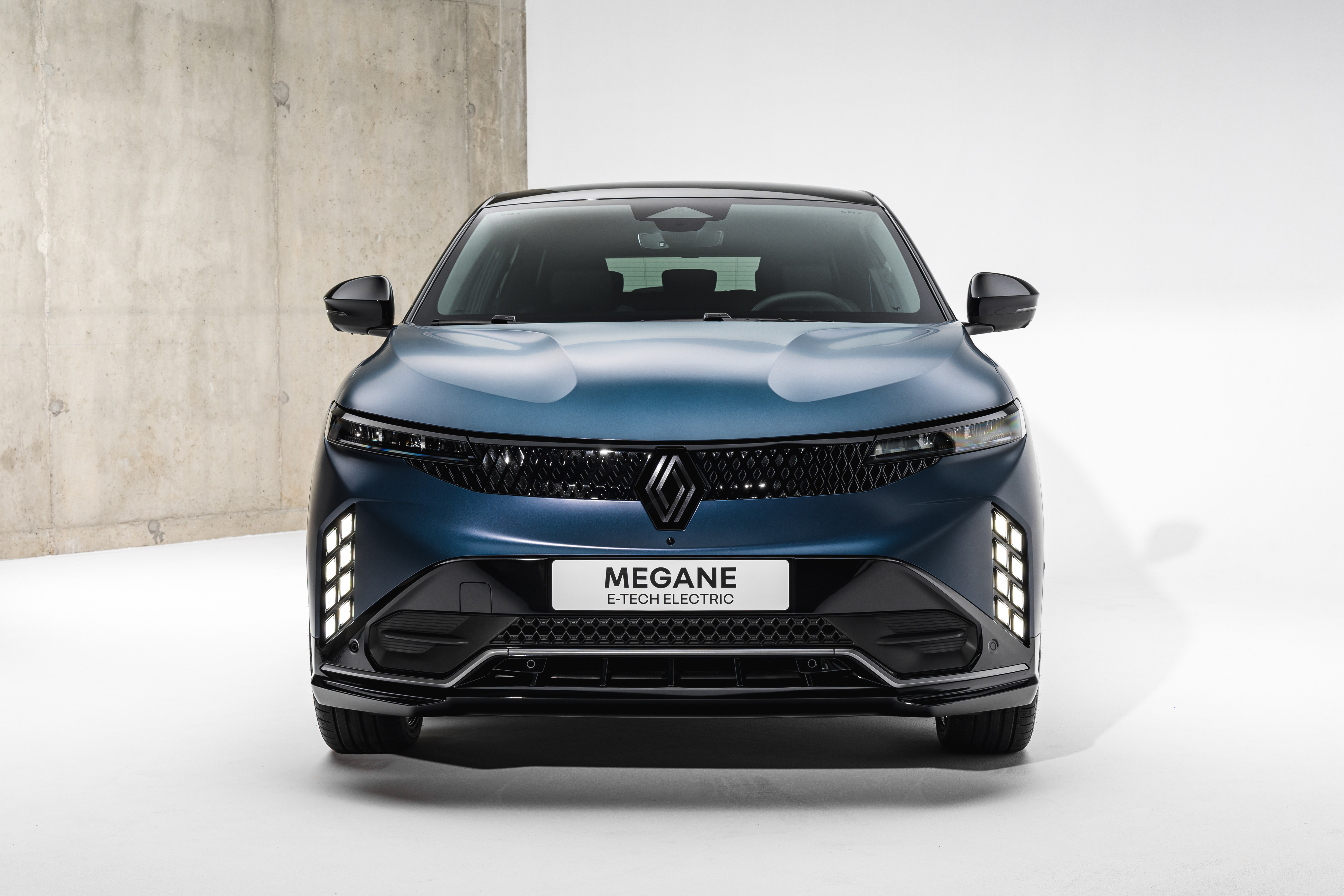Updated Renault Megane E-Tech electric showing its redesigned front end with new lighting signature and grille