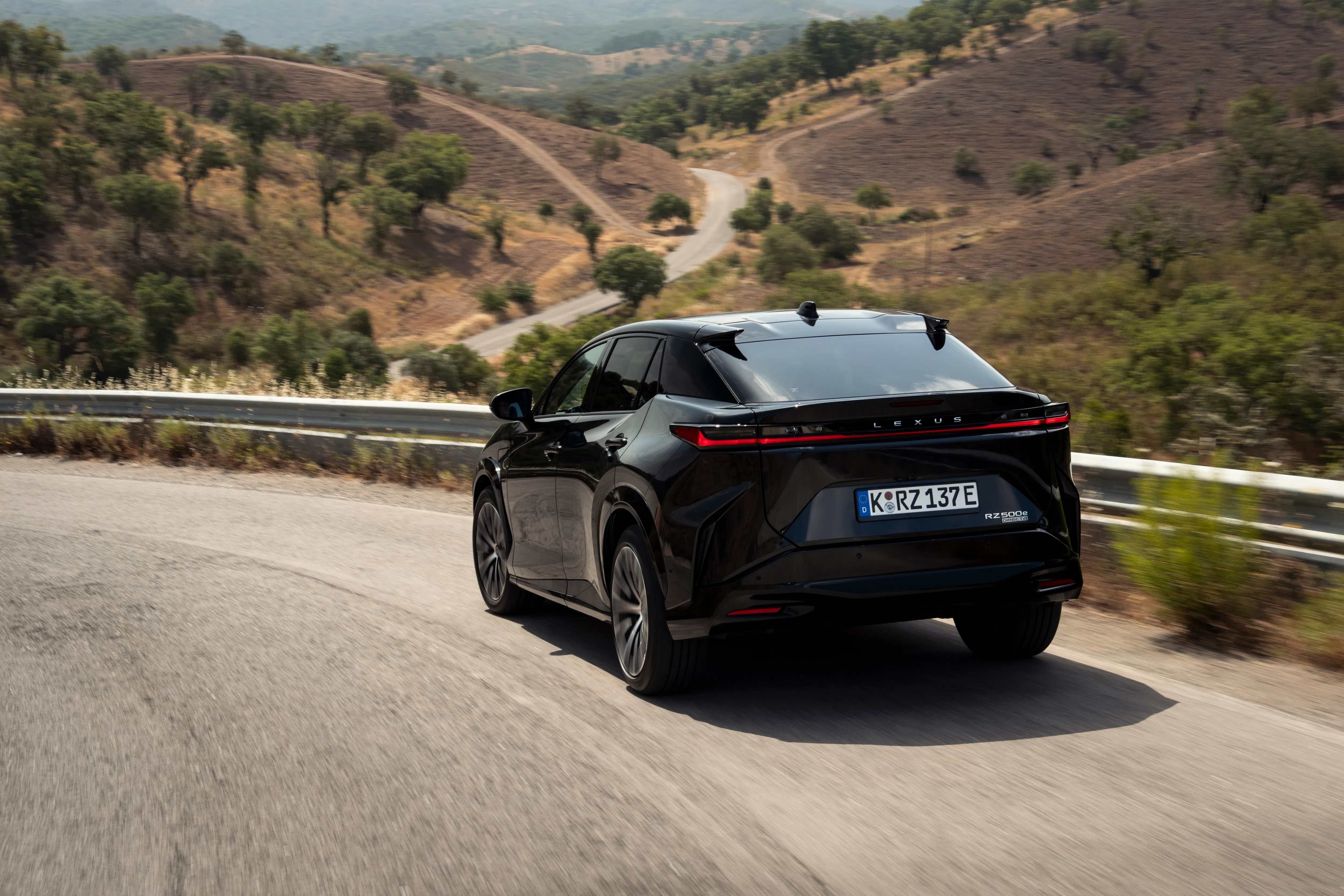 A Lexus RZ500e driving on a motorway - Image 3