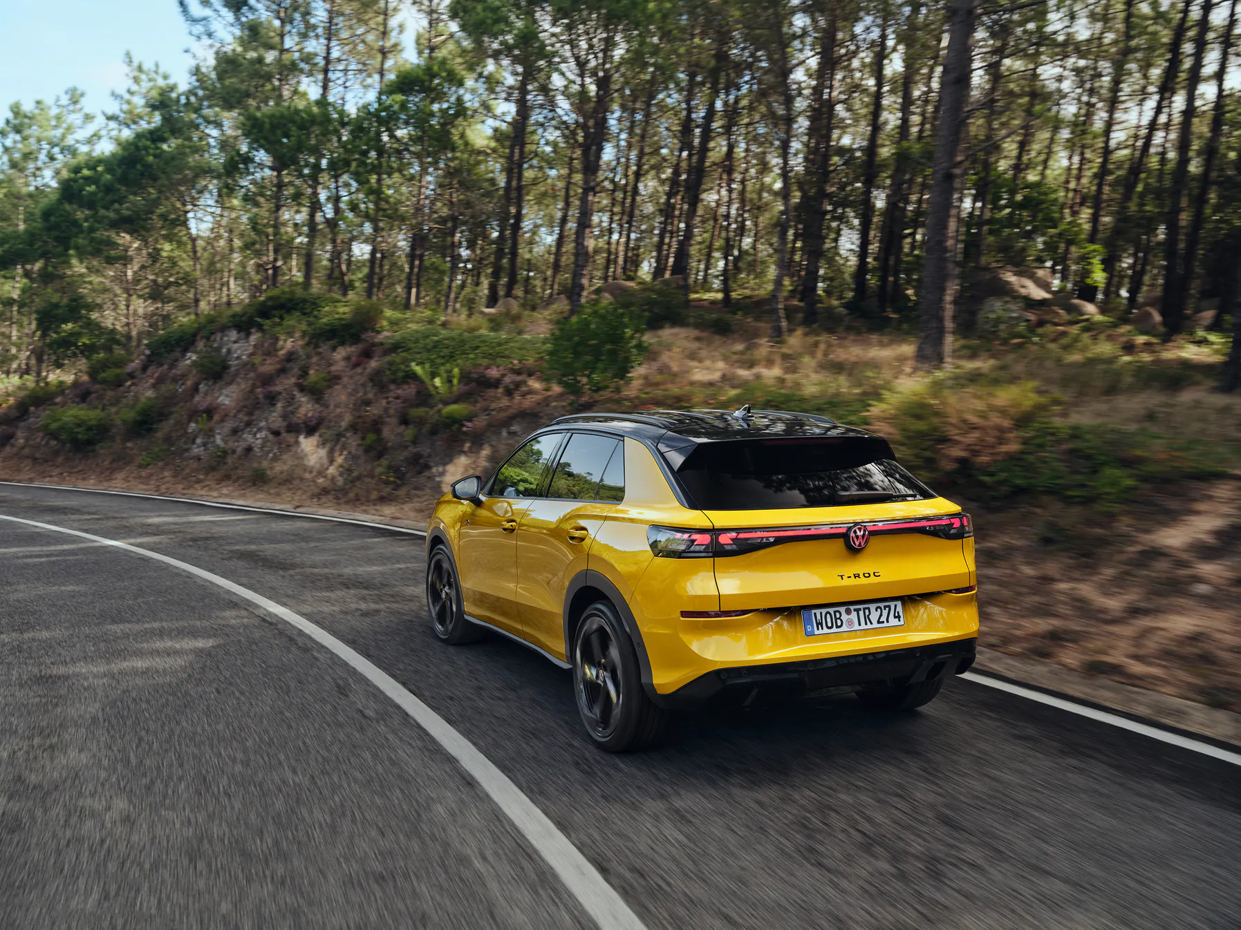 A yellow VW T-Roc Driving - Image 3