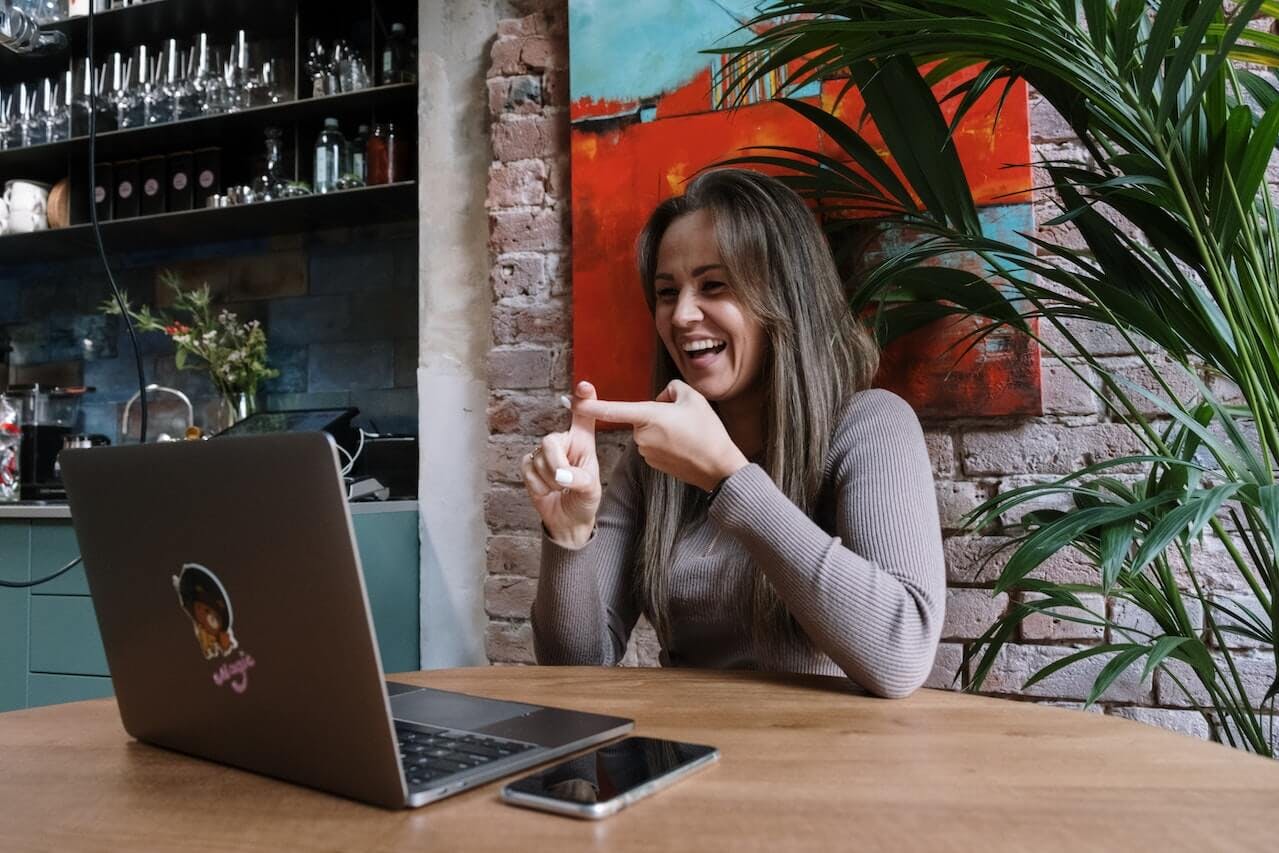 Worker happy on laptop