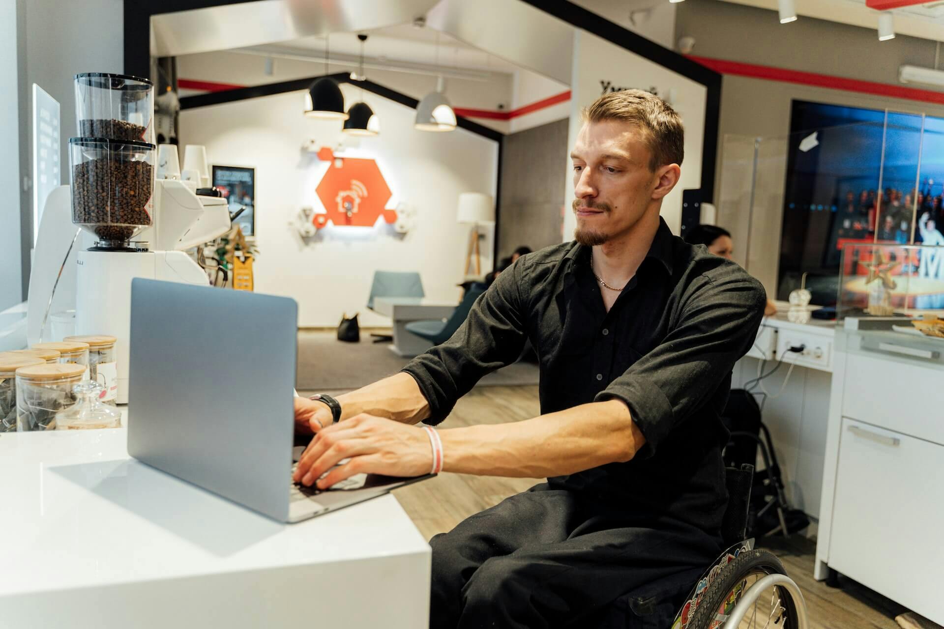 Worker with wheelchair at the office