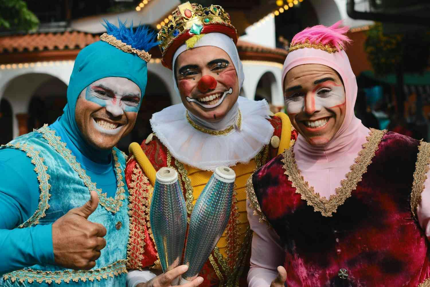 3 men in costumes