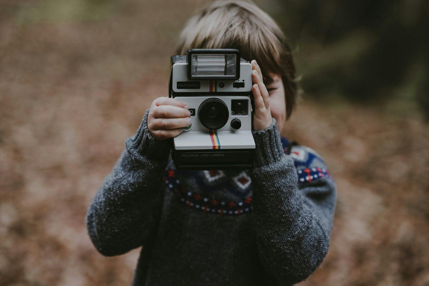 Child taking a photo