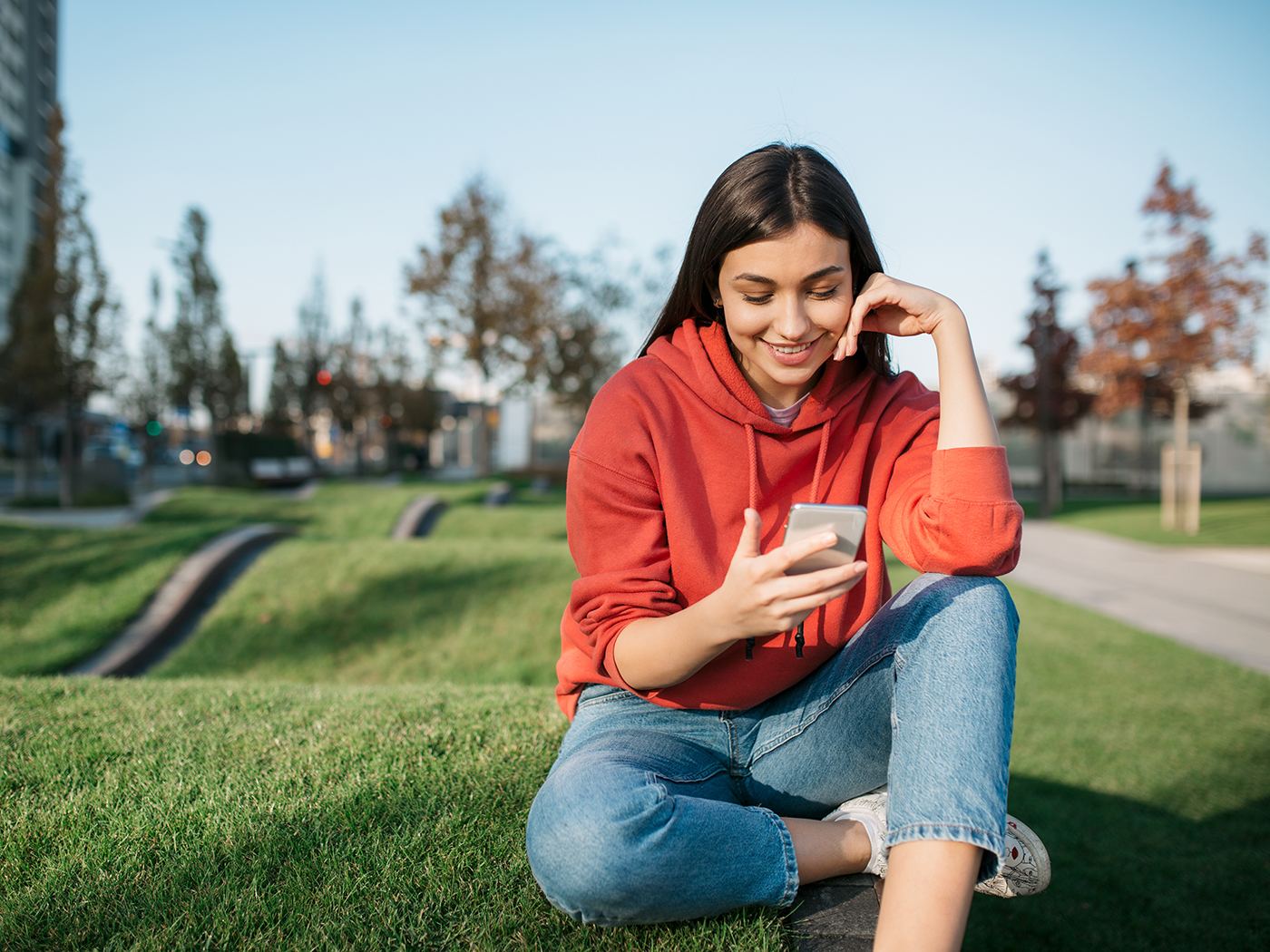 Girl looking into mobile