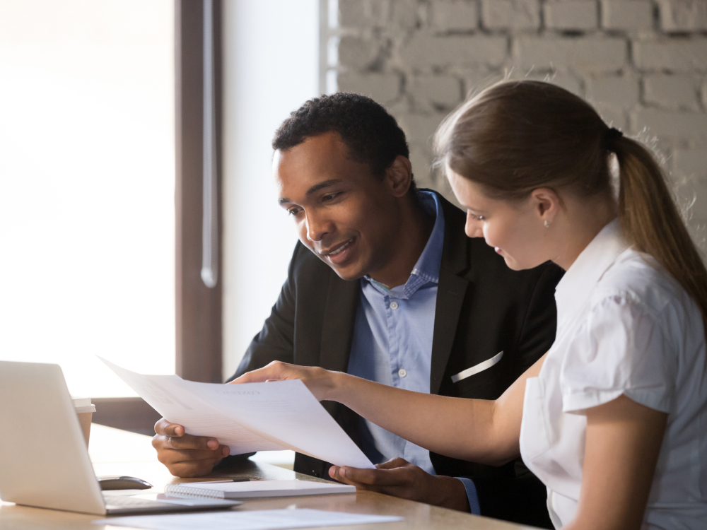 People reviewing paperwork