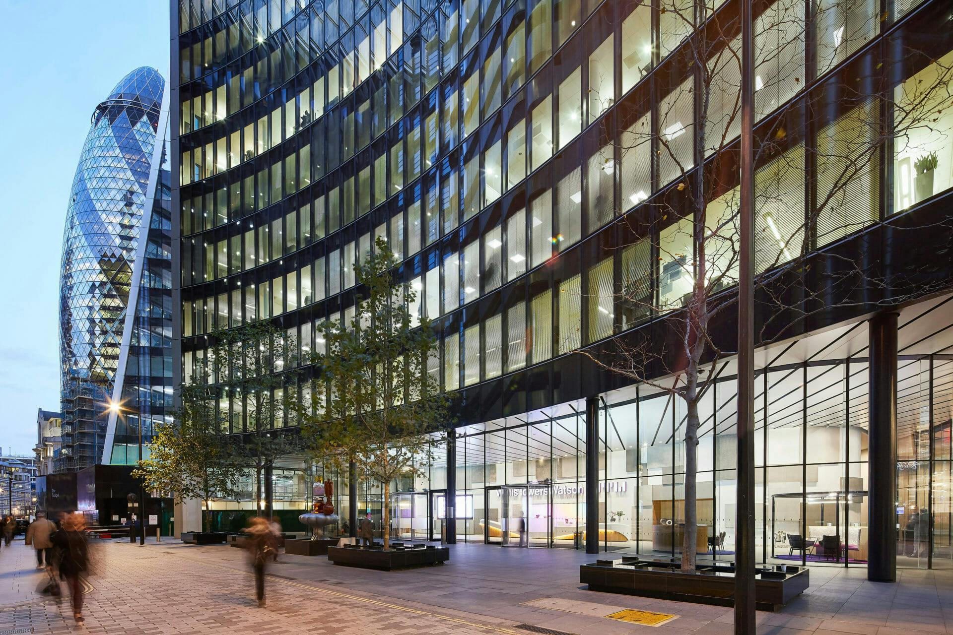 Willis Towers Watson building in London with Gherkin building in the background