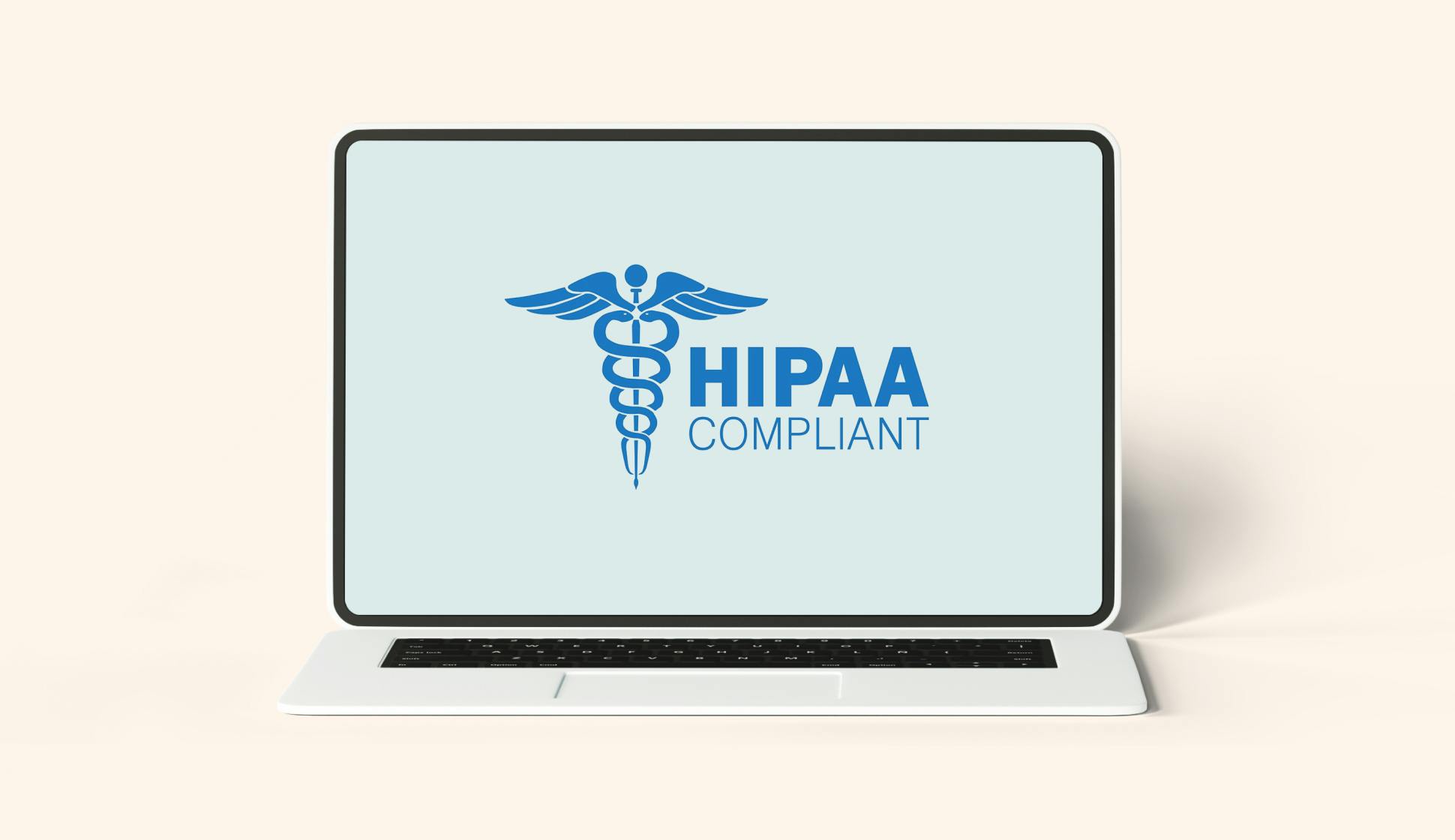 Laptop with a hipaa compliant logo on the screen