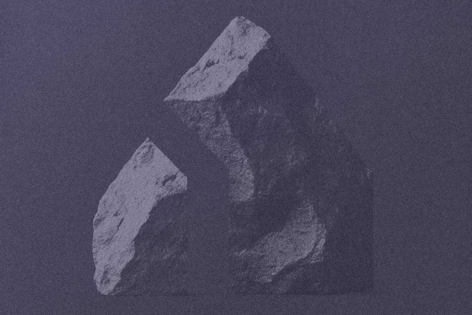 Mynd af kletti á fjólubláum bakgrunni.