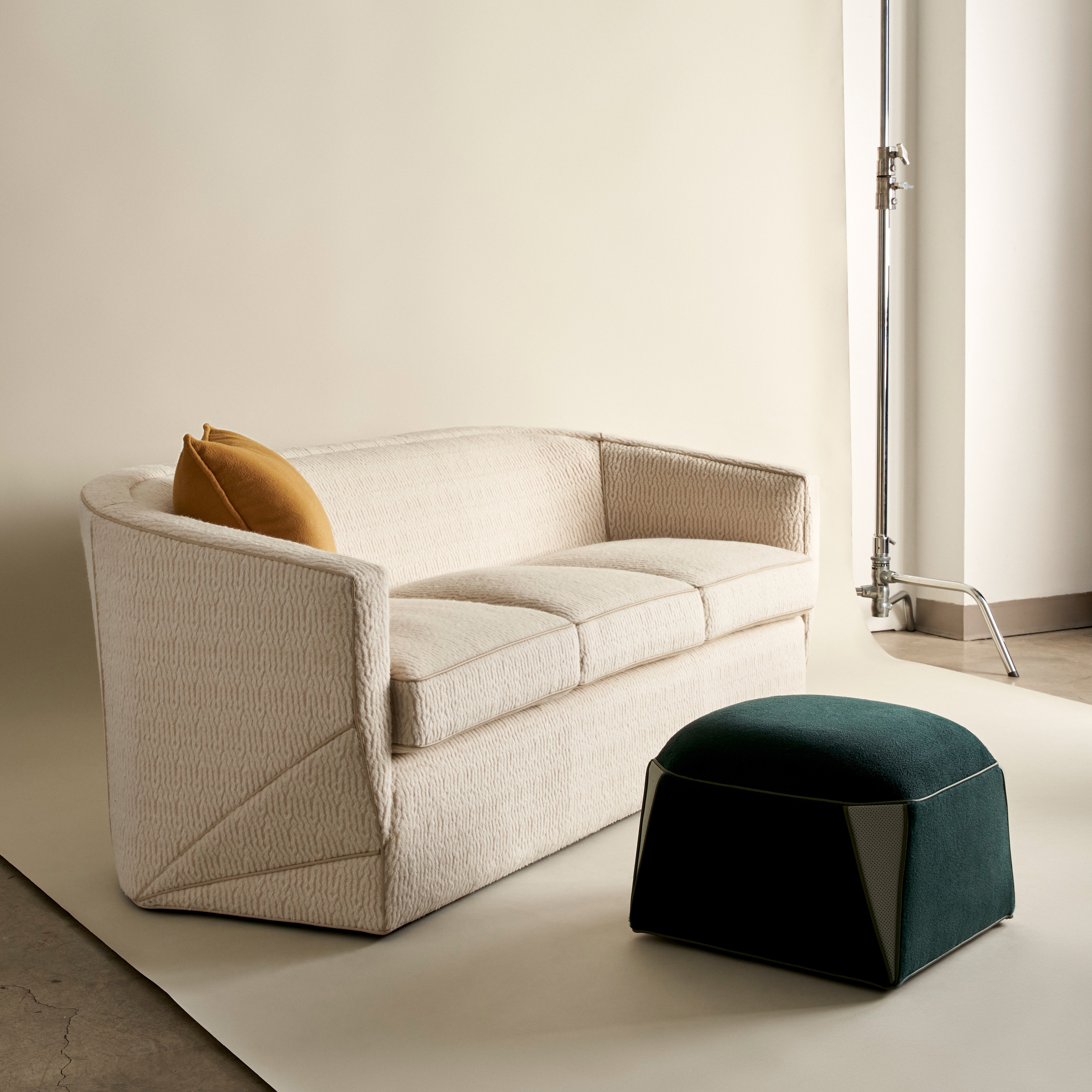 Drew-McGukin-Interior-Design-McSwivel-Settee-and-Pouf