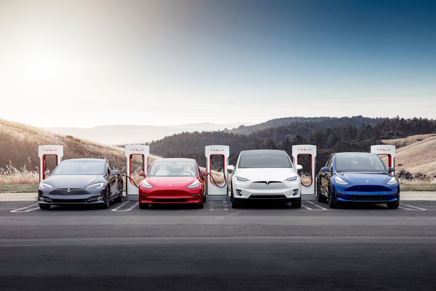 Tesla electric car line up at supercharger