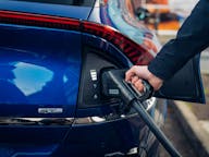 Blue Kia EV6 public charging
